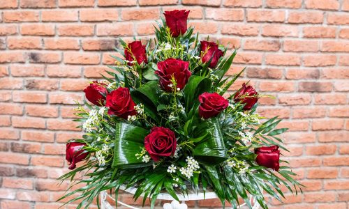 Centro de Rosas Rojas y Flor de Cera 35 euros